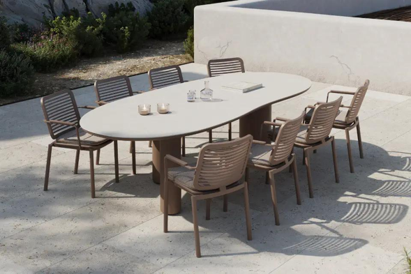 Terrasse estivale avec ensemble de table de jardin Amico de Bristol à la carte d’Exterioo meubles de jardin
