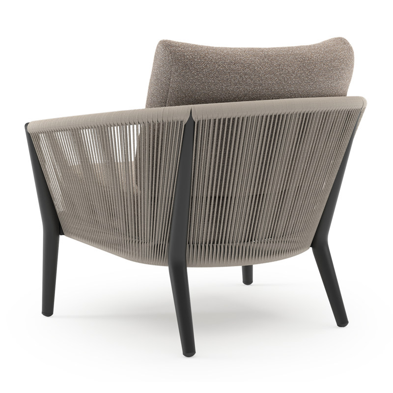 Orso loungestoel in zwart aluminium en beige verticaal geweven ronde rope met Wander Manioc all weather sunbrella® luxe kussen