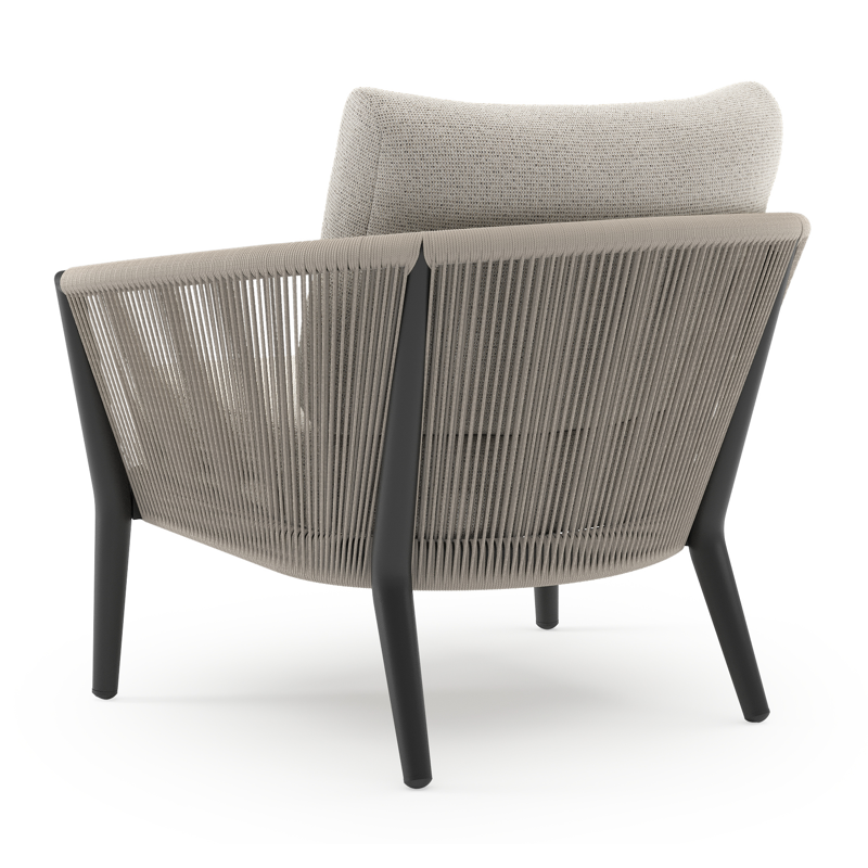 Orso loungestoel in zwart aluminium en beige verticaal geweven ronde rope met Firenze Natural all weather solica kussen