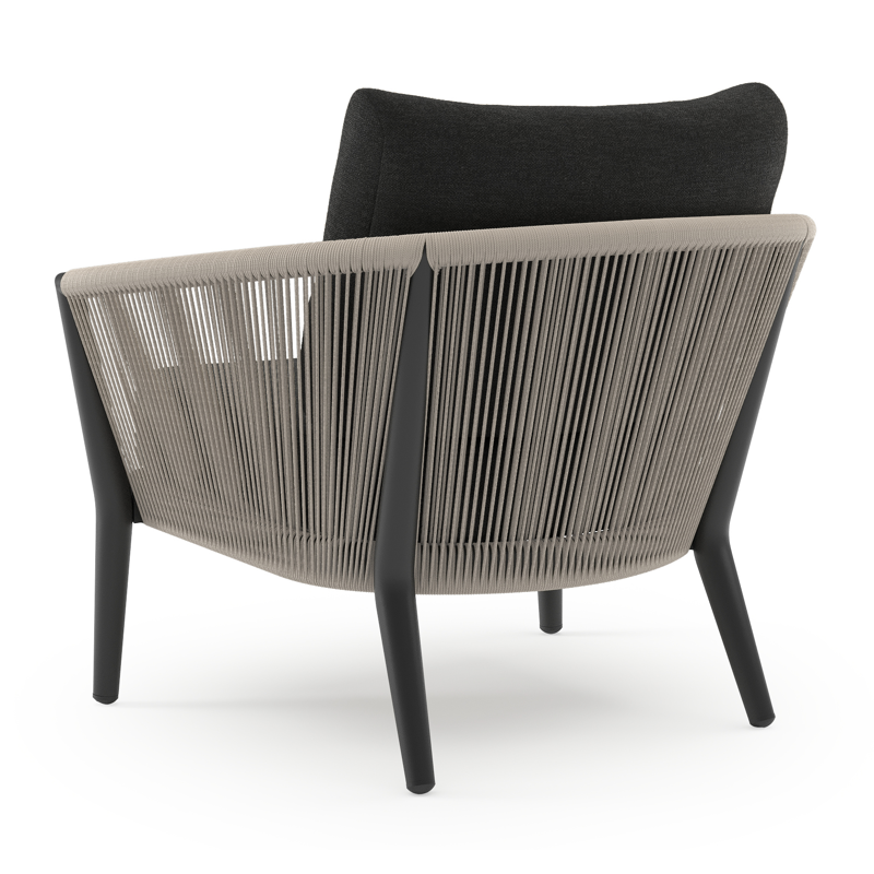 Orso loungestoel in zwart aluminium en beige verticaal geweven ronde rope met Chartres Sooty all weather sunbrella® luxe kussen