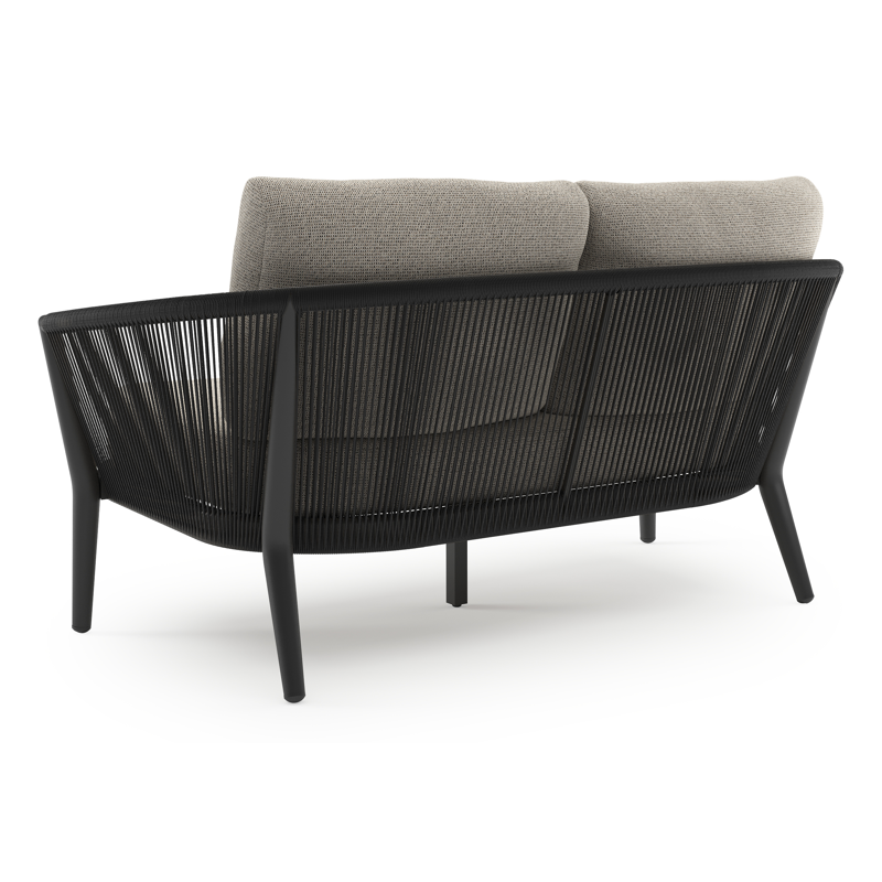 Orso loungebank in zwart aluminium en zwart verticaal geweven ronde rope met Firenze Sand all weather solica kussen
