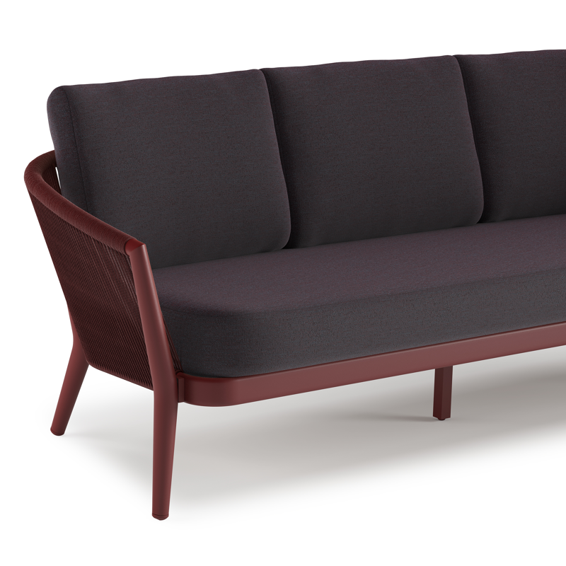 Orso loungebank in ruby aluminium en ruby verticaal geweven ronde rope met Tundra Red all weather sunbrella® luxe kussen