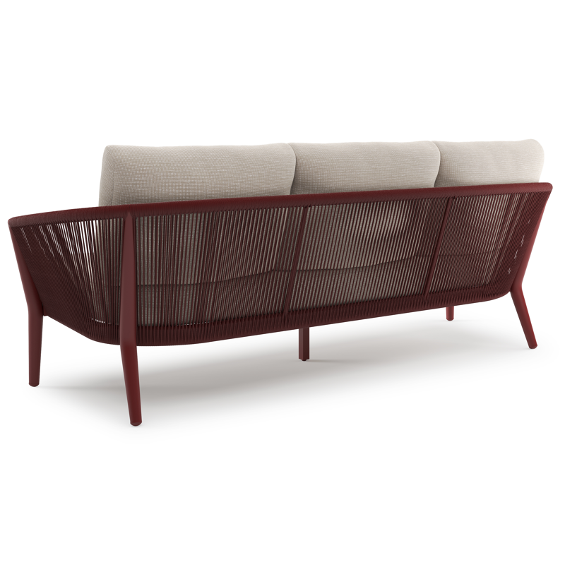 Orso loungebank in ruby aluminium en ruby verticaal geweven ronde rope met Slow Farafra all weather sunbrella® luxe kussen
