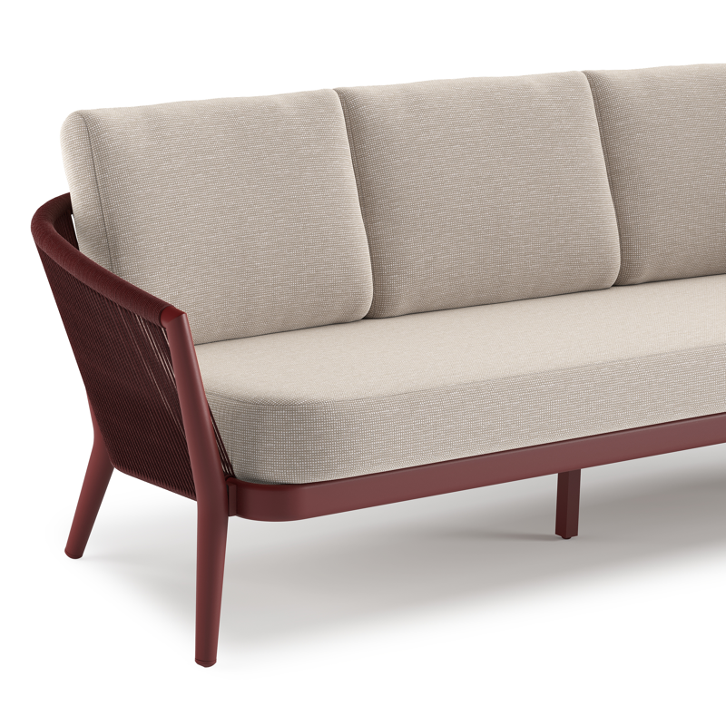 Orso loungebank in ruby aluminium en ruby verticaal geweven ronde rope met Slow Farafra all weather sunbrella® luxe kussen