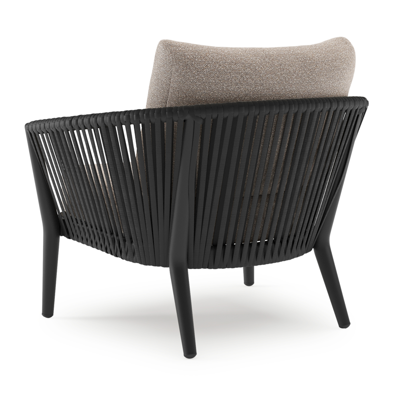 Orso loungestoel in zwart aluminium en zwart verticaal geweven luxe vlakke rope met Wander Manioc all weather sunbrella® luxe kussen