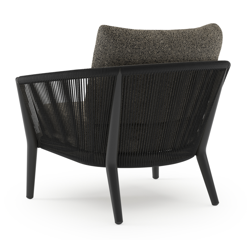 Orso loungestoel in zwart aluminium en zwart verticaal geweven ronde rope met Marbella Tunder all weather cosytica kussen
