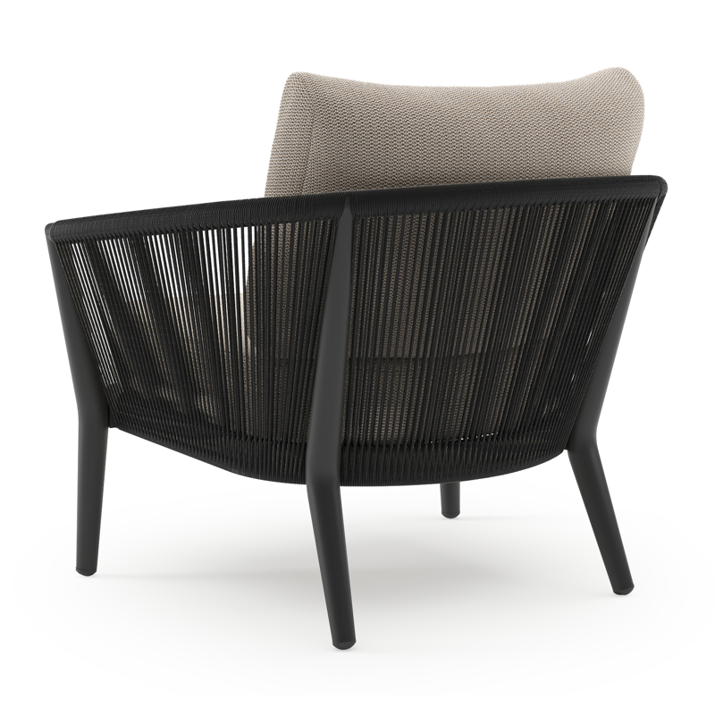 Orso loungestoel in zwart aluminium en zwart verticaal geweven ronde rope met Lopi Fossil all weather sunbrella® luxe kussen