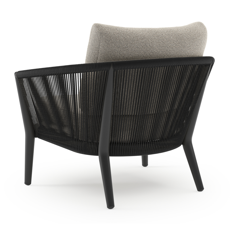 Orso loungestoel in zwart aluminium en zwart verticaal geweven ronde rope met Firenze Sand all weather solica kussen