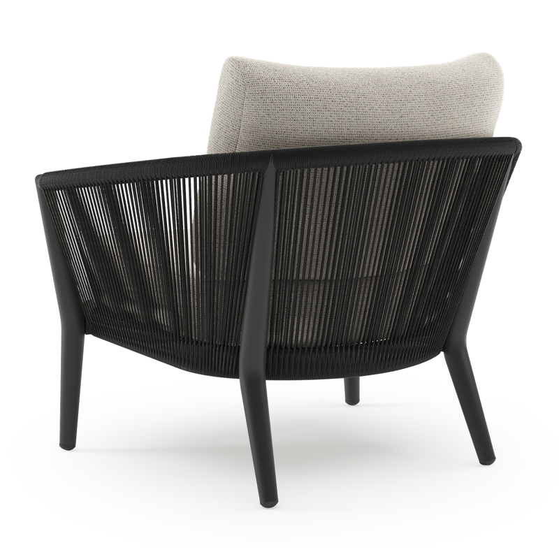 Orso loungestoel in zwart aluminium en zwart verticaal geweven ronde rope met Firenze Natural all weather solica kussen