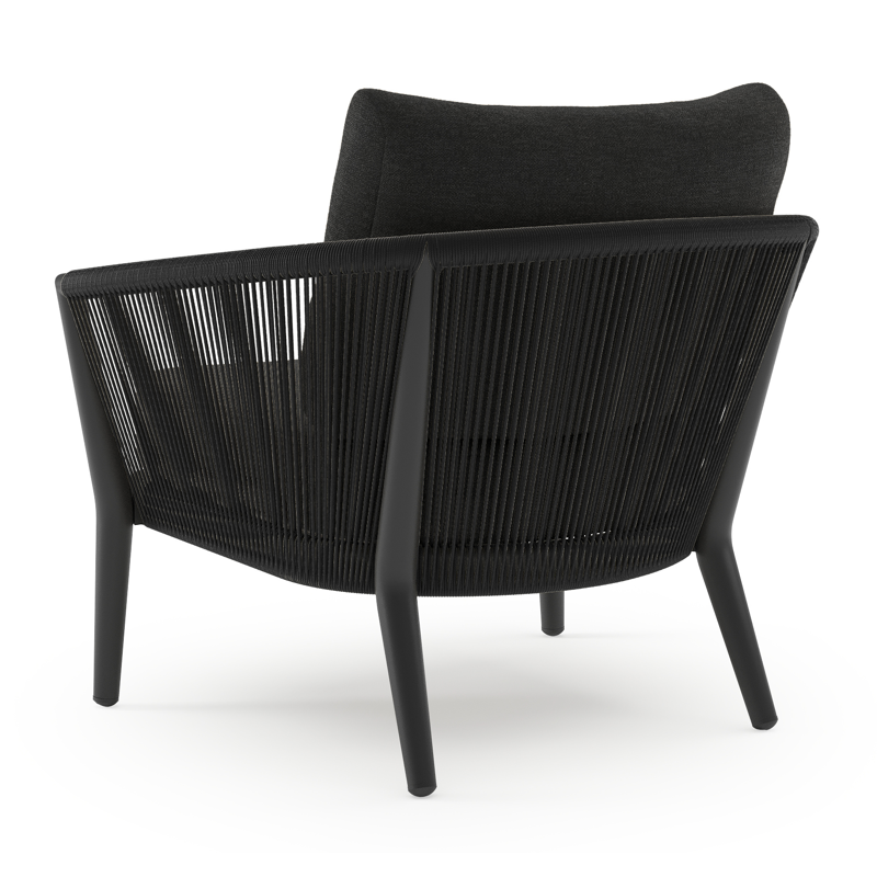 Orso loungestoel in zwart aluminium en verticaal geweven ronde rope met chartres sooty all weather sunbrella® luxe kussen