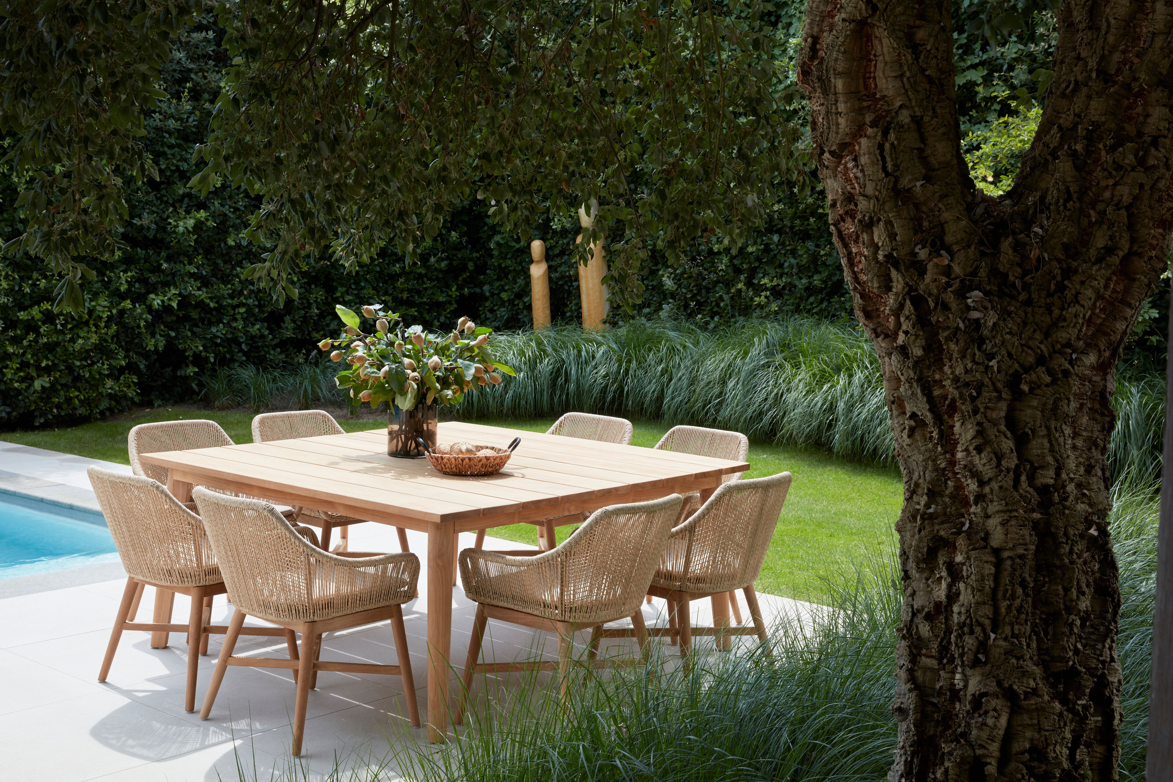 Borgo tuinstoel in teak en naturel gedraaide ronde wicker