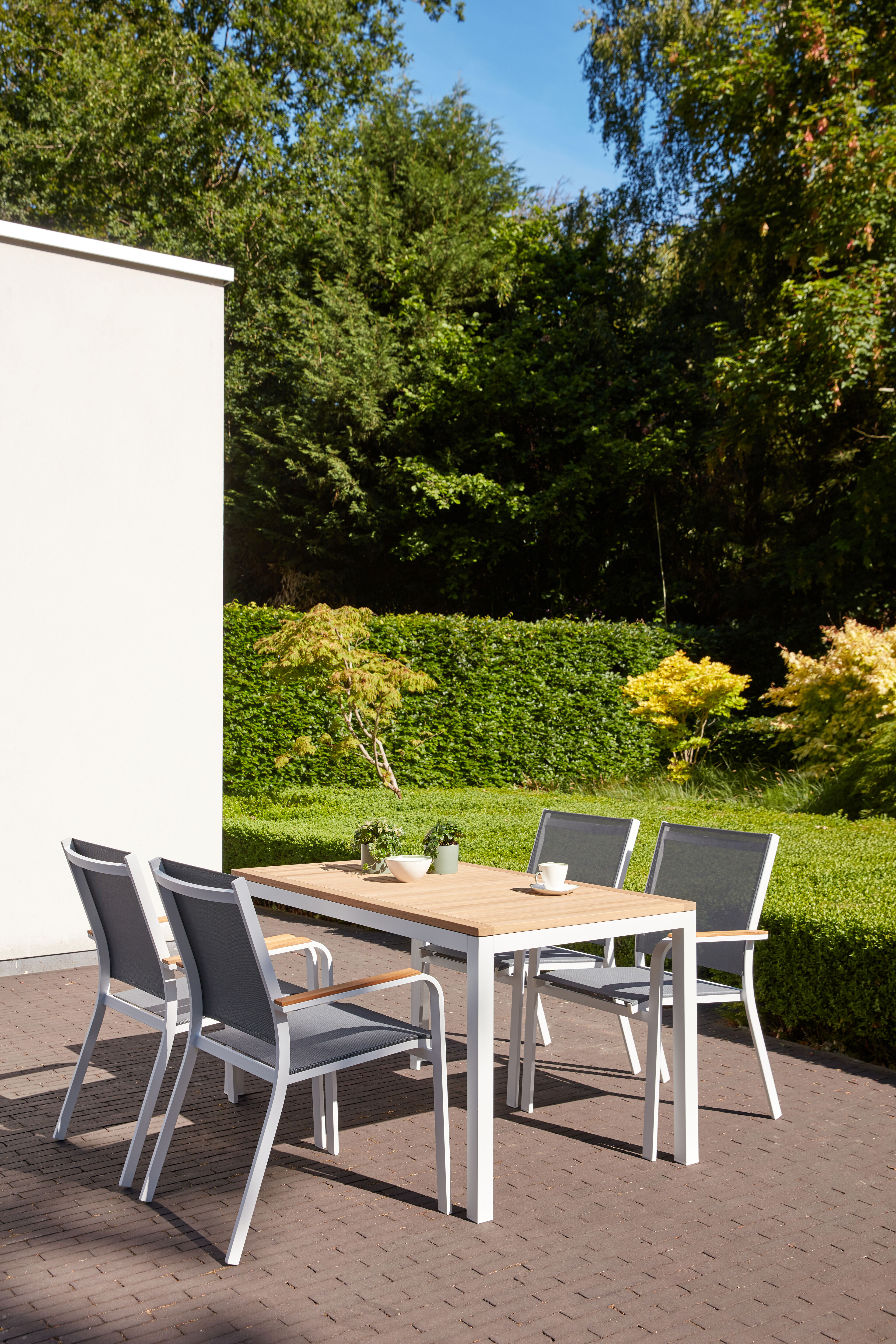 Pamplona ensemble de jardin ovale en aluminium blanc en teck natural finish avec 8 chaises de jardin Amalfi