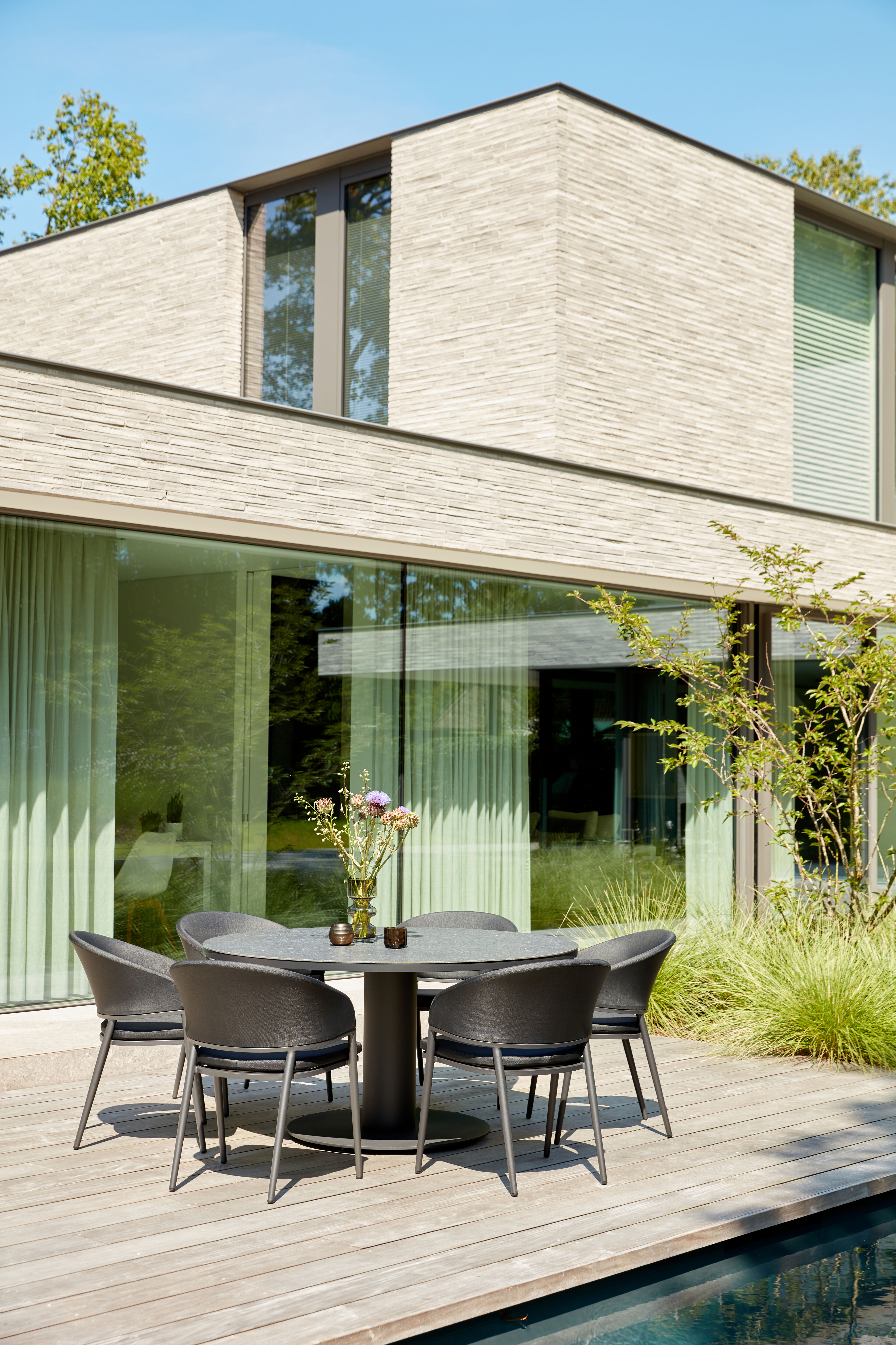 Lacrima tuinstoel in zwart aluminium en zwart comfort textilene