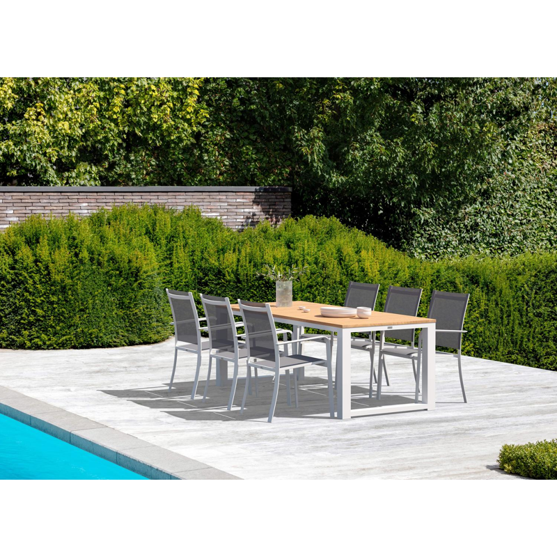 Livo tuinset in wit aluminium en naturel teak tafelblad met 6 stapelbare Calobra tuinstoelen