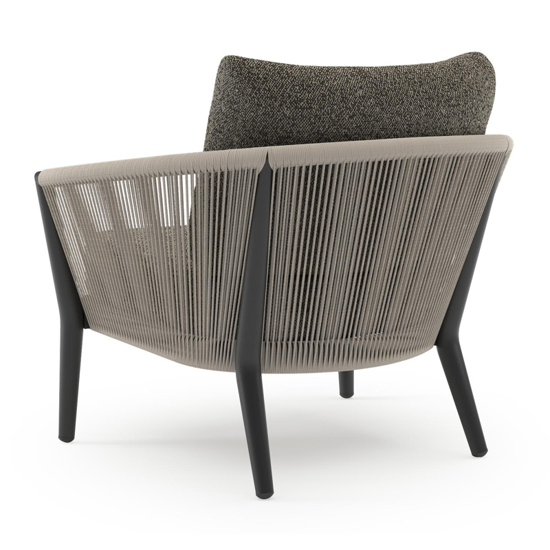 Orso loungestoel 1-zit in zwart aluminium en beige verticaal geweven ronde rope met marbella tunder All Weather Cosytica kussen