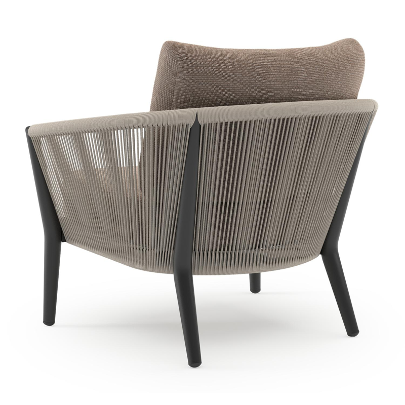 Orso loungestoel in zwart aluminium en beige verticaal geweven ronde rope met Savane Earth all weather sunbrella® luxe kussen