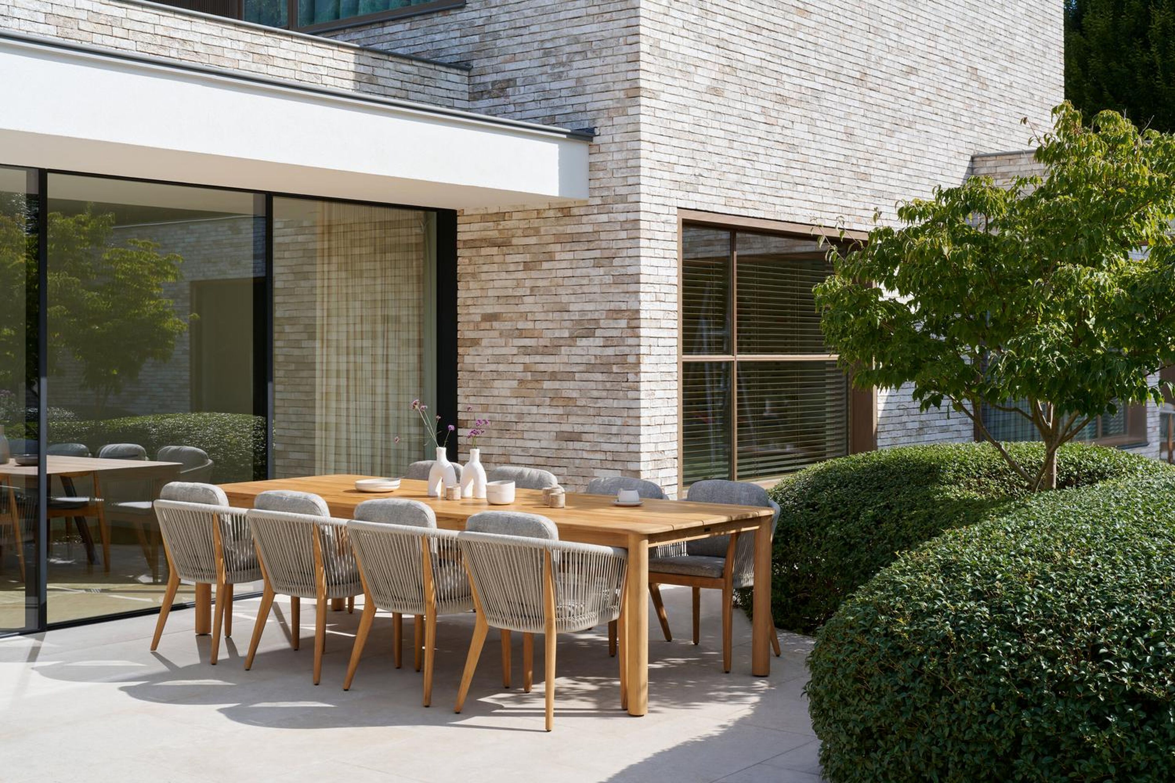 Orso tuinstoel in teak en beige verticaal geweven rope