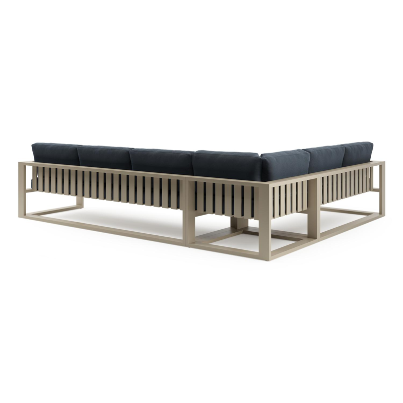 Verato loungehoek in beige aluminium met heritage indigo all weather sunbrella® luxe kussen