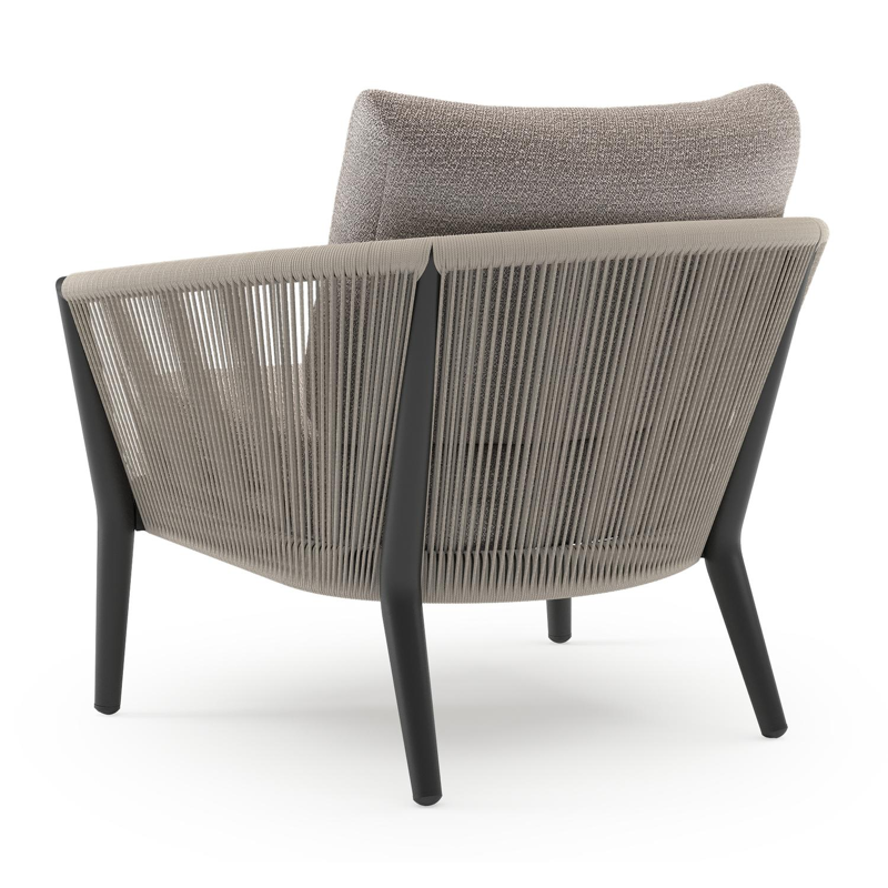 Orso loungestoel in zwart aluminium en beige verticaal geweven ronde rope met Wander Granite all weather sunbrella® luxe kussen