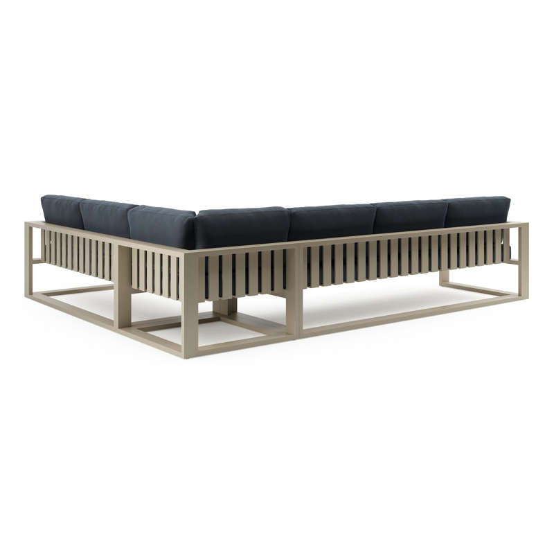 Verato loungehoek in beige aluminium met heritage indigo all weather sunbrella® luxe kussen