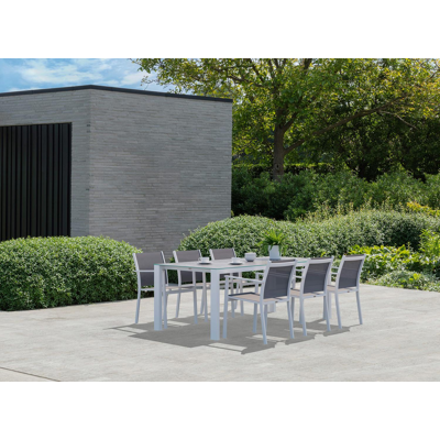 Trente tuinset in wit aluminium en grijs keramisch glas tafelblad met 6 stapelbare Bareto tuinstoelen