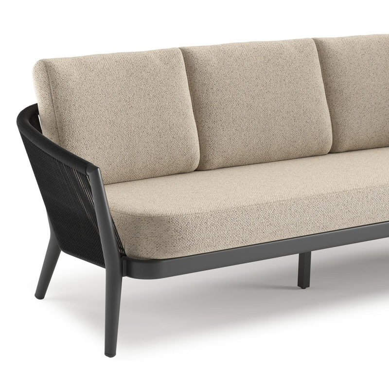 Orso loungeset in zwart aluminium en zwart verticaal geweven ronde rope met Bora Desert all weather cosytica kussen