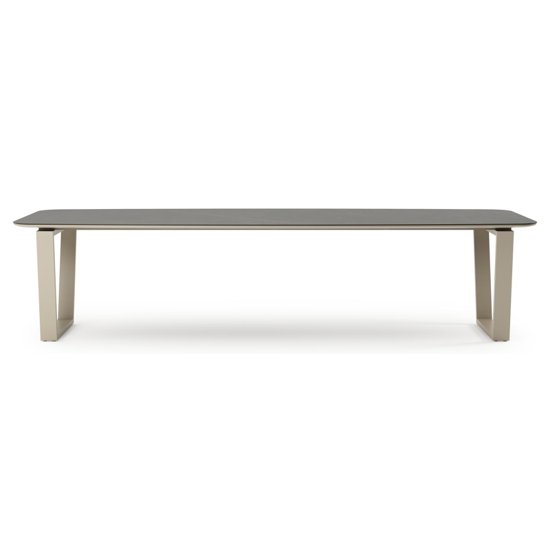 Table de jardin Pagino forme de bateau en aluminium beige et céramique pleine Calatorao - Lg. 315 x Lrg. 115 x Haut. 73 cm