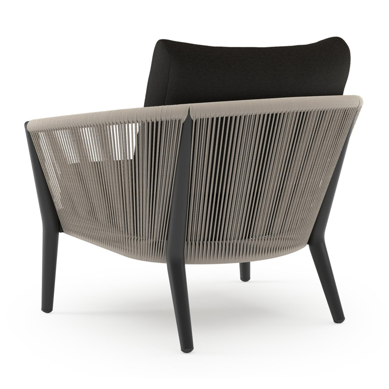 Orso loungestoel in zwart aluminium en beige verticaal geweven ronde rope met Heritage Char all weather sunbrella® luxe kussen