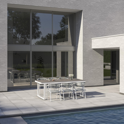 Merida tuinset in wit aluminium en grijs keramische print tafelblad met 6 stapelbare Vigo tuinstoelen