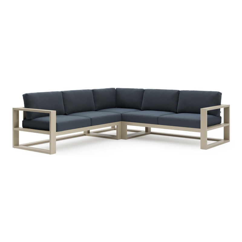 Verato loungehoek in beige aluminium met heritage indigo all weather sunbrella® luxe kussen