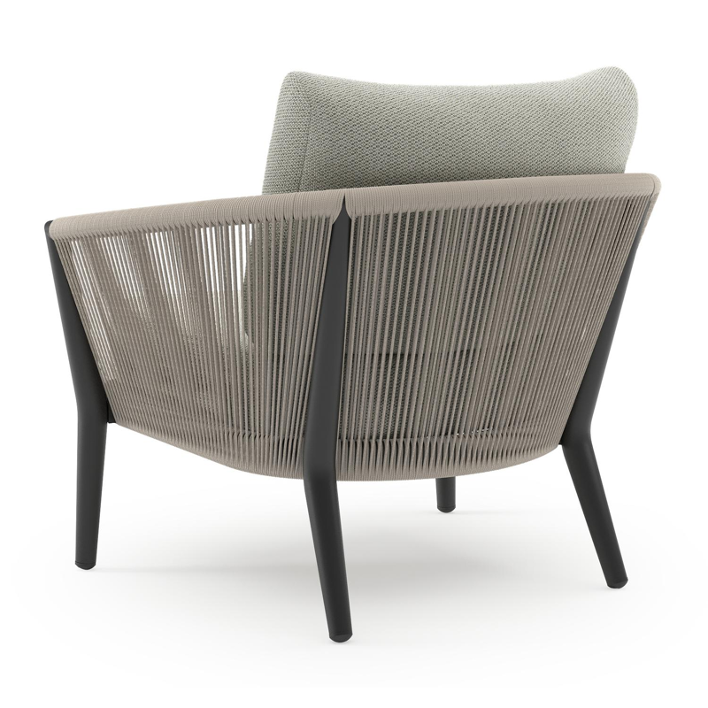 Orso loungestoel in zwart aluminium en beige verticaal geweven ronde rope met Lopi Bud all weather sunbrella® luxe kussen