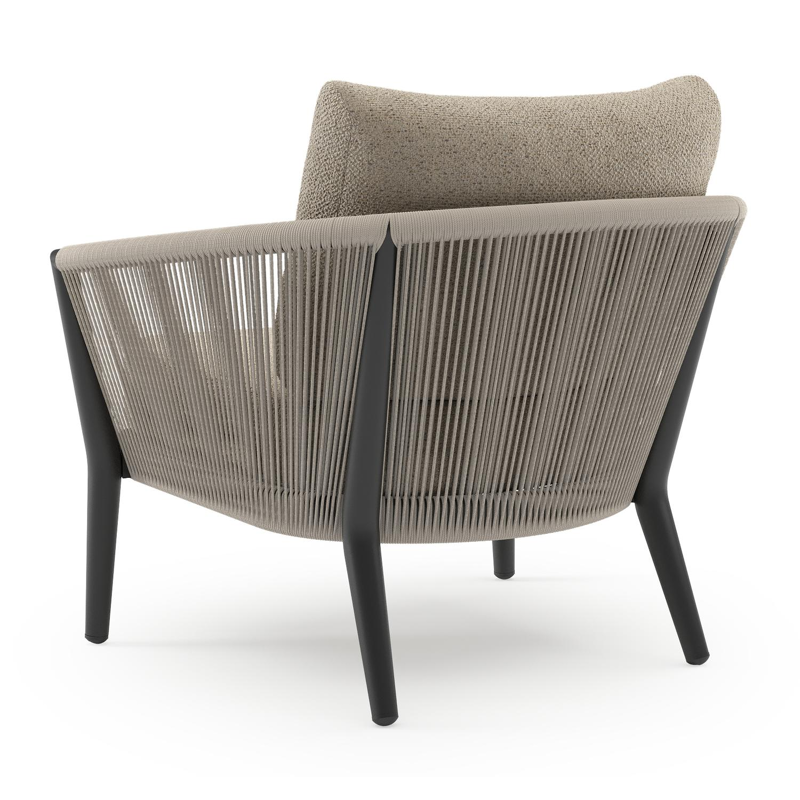 Orso loungestoel in zwart aluminium en beige verticaal geweven ronde rope met Bora Desert all weather cosytica kussen