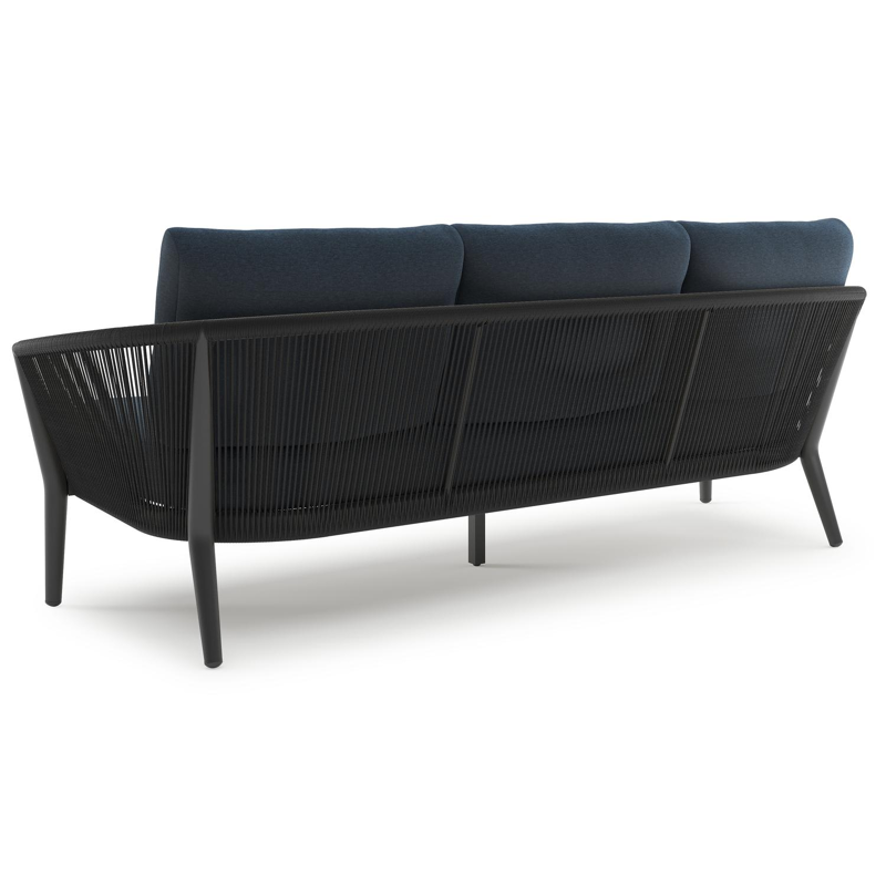 Orso loungeset in zwart aluminium en zwart verticaal geweven ronde rope met Heritage Indigo All Weather Sunbrella® luxe kussen