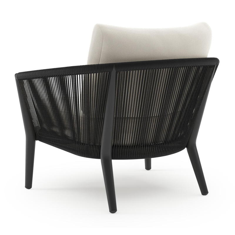 Orso loungestoel in zwart aluminium en zwart verticaal geweven ronde rope met Savane White all weather sunbrella® luxe kussen