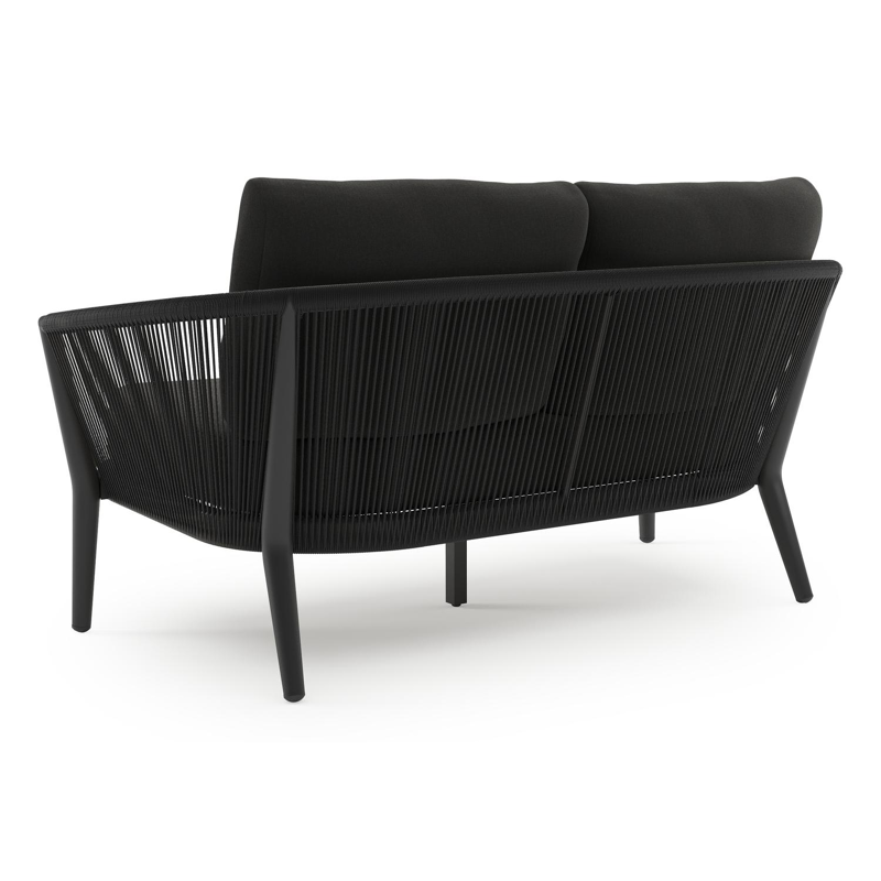 Orso loungebank in zwart aluminium en zwart verticaal geweven ronde rope met Natte Sooty all weather sunbrella® luxe kussen