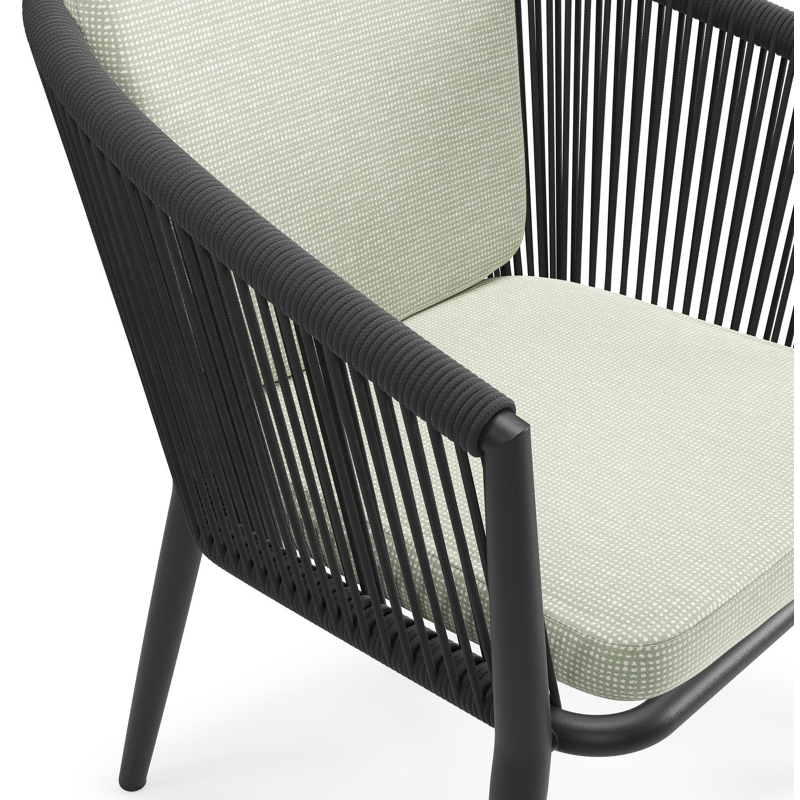 Orso tuinstoel in zwart aluminium en zwart verticaal geweven ronde rope met zitkussen in All Weather Sunbrella® Luxe Slow Spirea