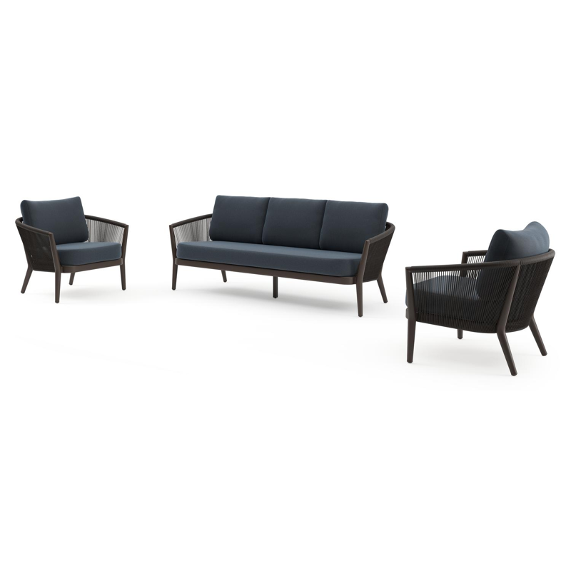 Orso loungeset in donkerbruin aluminium en donkerbruin verticaal geweven ronde rope met Heritage Indigo All Weather Sunbrella® luxe kussen