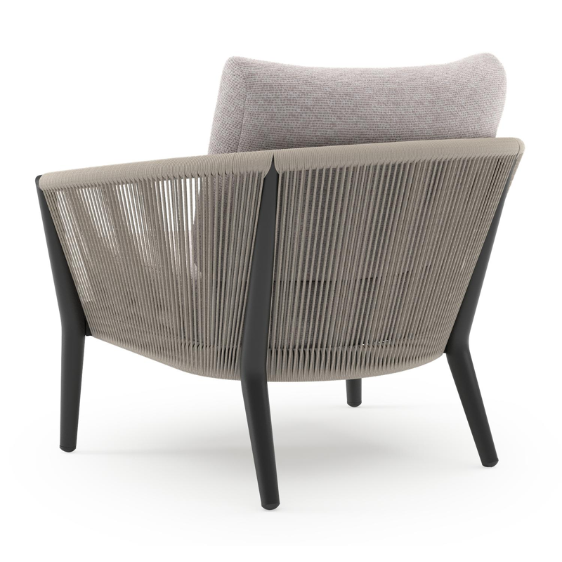 Orso loungestoel in zwart aluminium en beige verticaal geweven ronde rope met Wander Gobi all weather sunbrella® luxe kussen