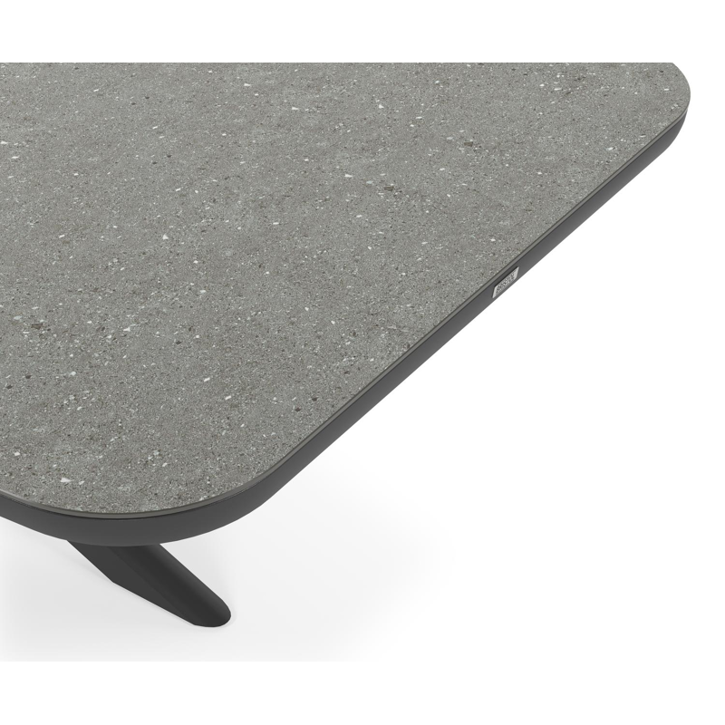 Table de jardin Pamplona forme de bateau en aluminium noir et sintered stone gris - Lg. 270 x Lrg. 115 x Haut. 72.5 cm
