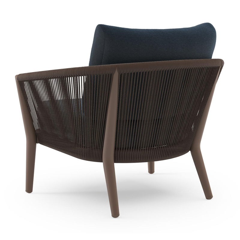 Orso loungestoel in taupe aluminiumen zwart verticaal geweven ronde rope met Heritage Indigo All Weather Sunbrella® luxe kussen