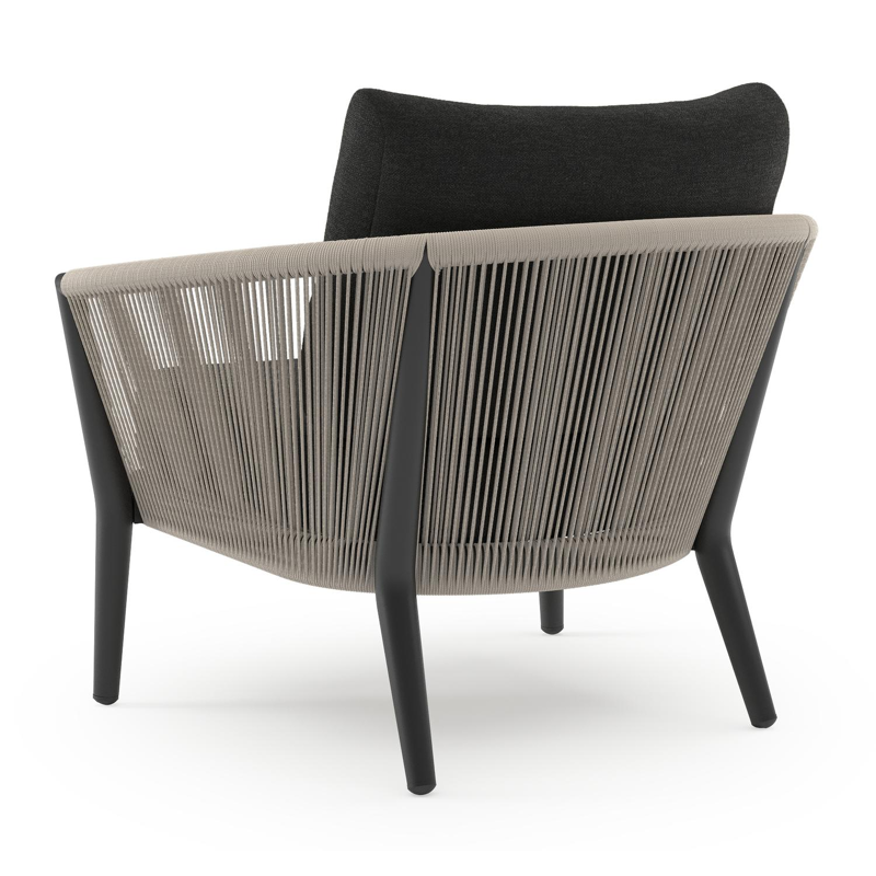 Fauteuil de jardin Orso en aluminium noir en corde ronde tissée verticalement beige et coussins en all weather sunbrella® luxe Chartres Sooty