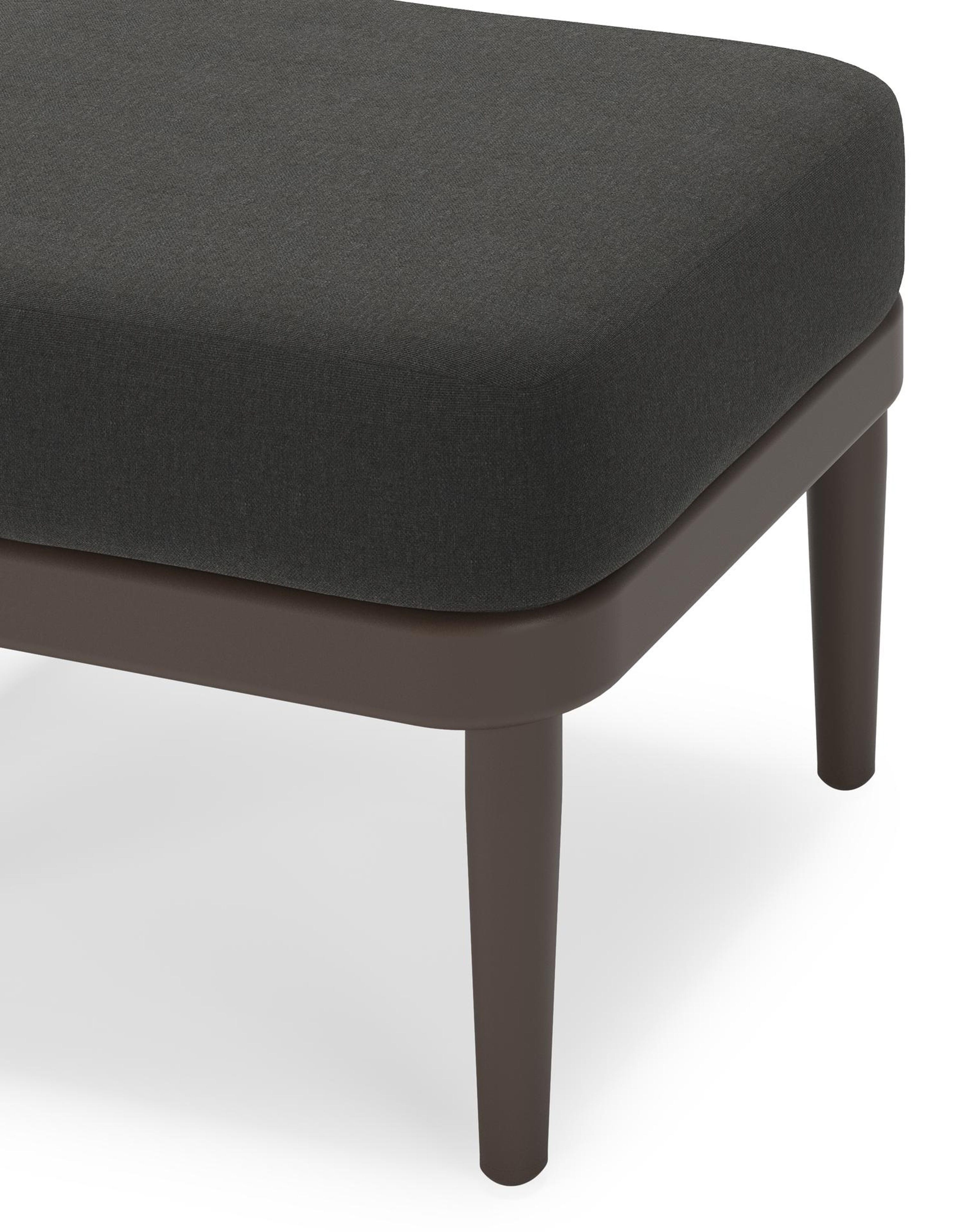 Orso poef in donkerbruin aluminium met Natte Sooty all weather sunbrella® luxe kussen