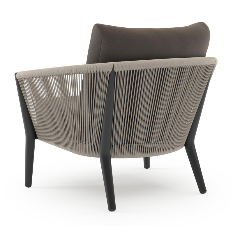 Orso loungestoel in zwart aluminium en beige verticaal geweven ronde rope met Natte Nature Grey all weather sunbrella® luxe kussen