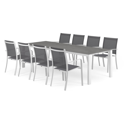 Trente tuinset in wit aluminium en grijs volkeramiek tafelblad met 8 stapelbare Calobra tuinstoelen