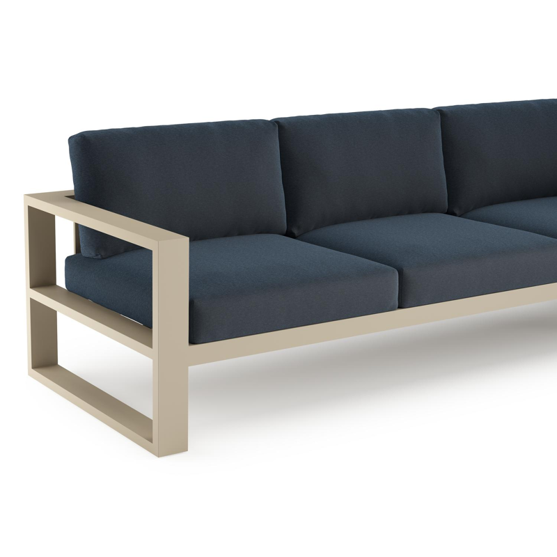 Verato loungehoek in beige aluminium met heritage indigo all weather sunbrella® luxe kussen