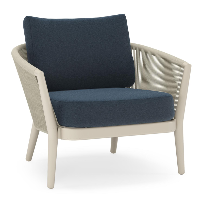 Fauteuil de jardin Orso en aluminium beige en corde ronde tissée verticalement beige et coussins en all weather sunbrella® luxe Heritage Indigo