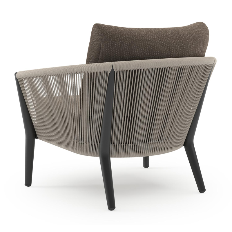 Orso loungestoel in zwart aluminium en beige verticaal geweven ronde rope met Lopi Coconut all weather sunbrella® luxe kussen