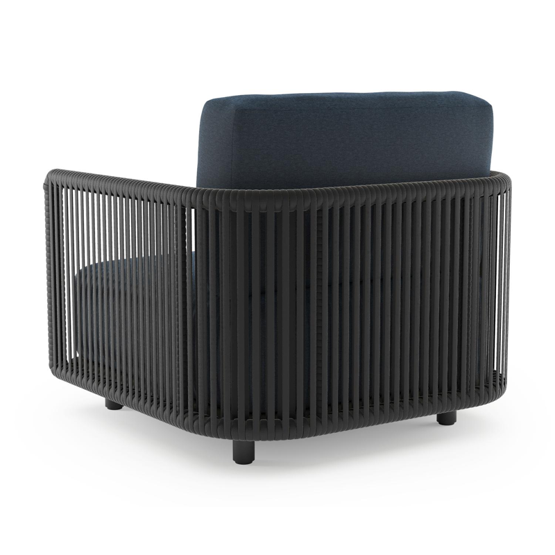 Organo loungestoel in zwart aluminium en zwart verticaal geweven luxe vlakke rope met heritage indigo all weather Sunbrella® luxe kussen