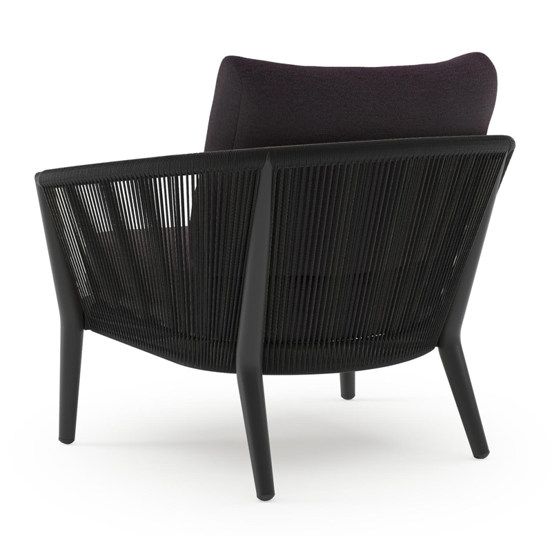 Orso loungestoel in zwart aluminium en zwart verticaal geweven ronde rope met Tundra Red all weather sunbrella® luxe kussen