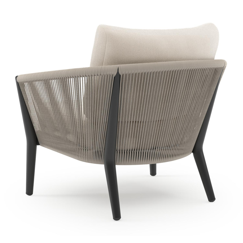 Orso loungestoel in zwart aluminium en beige verticaal geweven ronde rope met Lopi Snow all weather sunbrella® luxe kussen